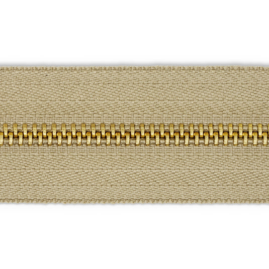 44228|Dritz Brass Upholstery Zipper, Beige, 30"